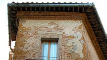 eave of building in Pienza, Italy