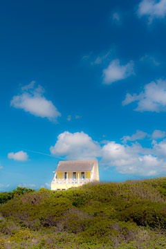 house looking across preserved coastal vegetation at Schooner Bay, Bahamas