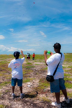 children flying kites at the first Schooner Springfest in 2011, Schooner Bay, Bahamas