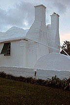 white stucco chimneys and cistern at the end of a house in Bermuda