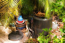 compost station in the garden of the Chael-Dover Cottage in Miami, Florida