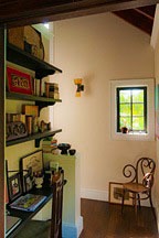 stair landing doubling as study in the Chael-Dover Cottage in Miami, Florida