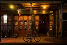 bike chained to French Quarter gallery pole late at night