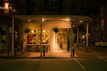 New Orleans French Quarter gallery and shopfront at night